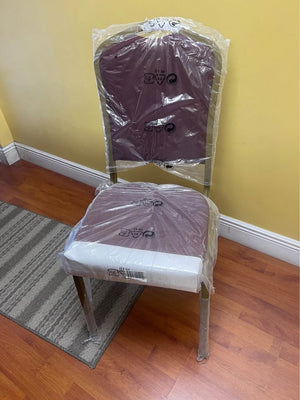 Chairs with crown backs, burgundy/red fabric, and gold-grained metal frames.