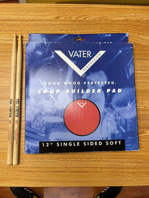 Vater single-sided soft practice pad 12 in. red and 2 drumsticks (used)