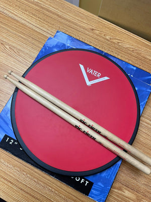 Vater single-sided soft practice pad 12 in. red and 2 drumsticks (used)